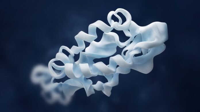 A pale folded protein ribbon on a dark blue background, suggesting a hidden signature woven into its shape.